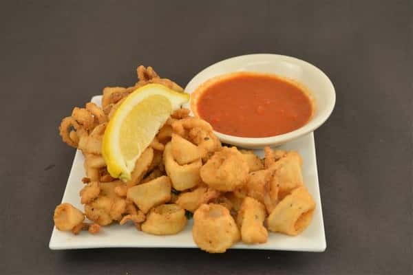 Fried delicacy with dipping sauce