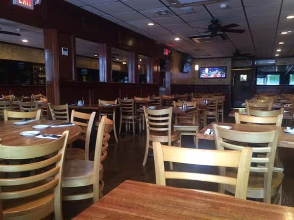 Dining area with tv in the background