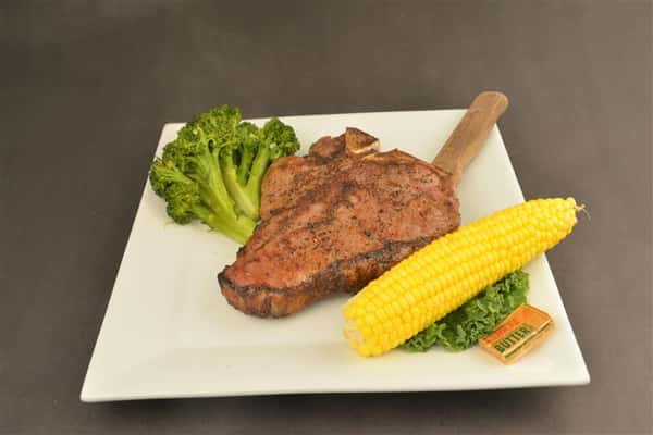 Steak with corn and broccoli