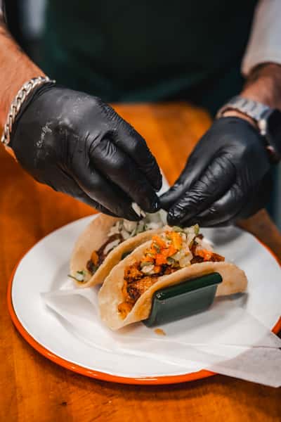 Man preparing a taco
