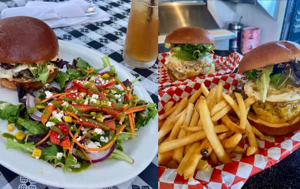 Side-by-side image showcasing gourmet burgers from The Riders Club Café—on the left, a juicy cheeseburger paired with a fresh mixed greens salad topped with carrots, corn, feta, and a vibrant green dressing; on the right, two burgers with crispy fries, featuring over-easy eggs and melted cheese on red-checkered baskets.