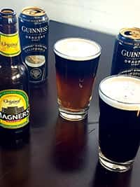 Pints of Guinness and Magners cider served alongside beer cups.