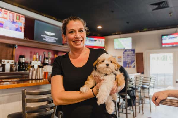 Customer and Nugget the dog (2) Tampa Tap Room
