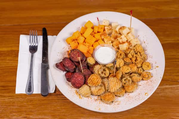 Appetizer sampler with cheese cubes, sausage, and fried bites at Jake & Rip's in Grenada, MS.