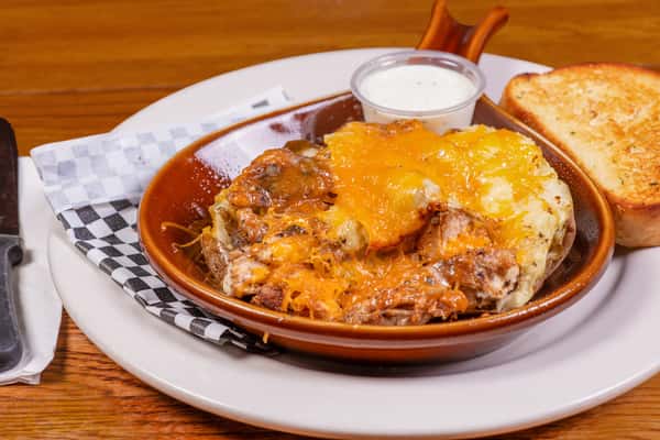 Loaded chicken tater with melted cheese and bacon at Jake & Rip's in Grenada, Mississippi.