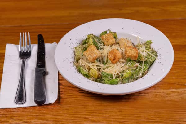 Caesar salad topped with croutons at Jake & Rip's, a casual Southern restaurant in Grenada, Mississippi.