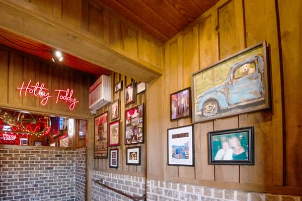 Hallway interior with rustic decor inside Jake & Rip's restaurant in Grenada, Mississippi.