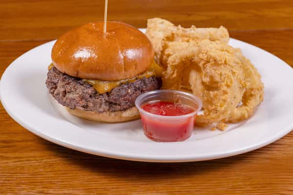 Cheeseburger with onion rings and dipping sauce at Jake & Rip's in Grenada, Mississippi.