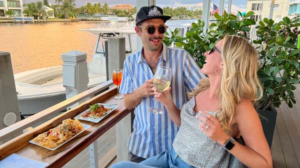 Couple dining on the Intracoastal in Deerfield Beach at the Cove