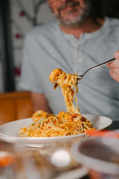 Linguine with lobster, shrimp, chili butter, breadcrumbs & chives