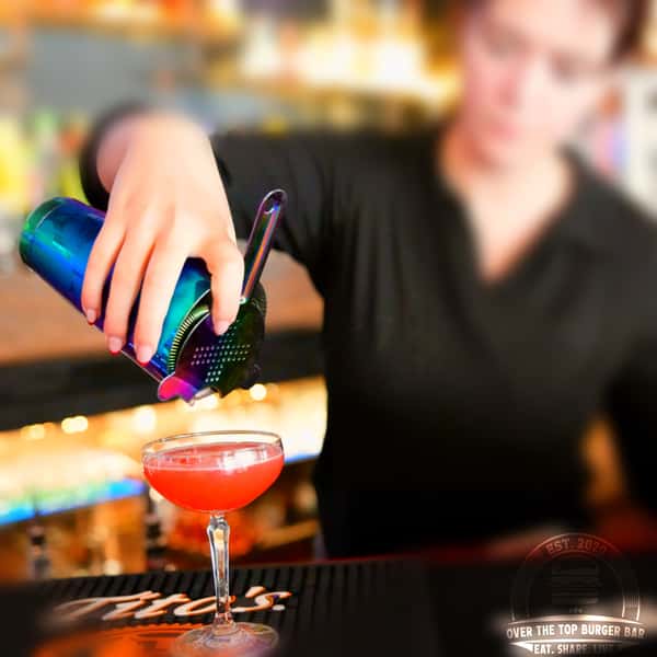 bartender pouring dirnk