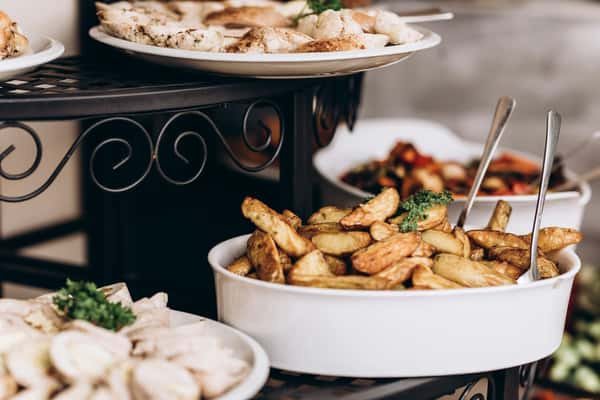 buffet plate with roasted potatoes and dumplings served in a casual dining setting
