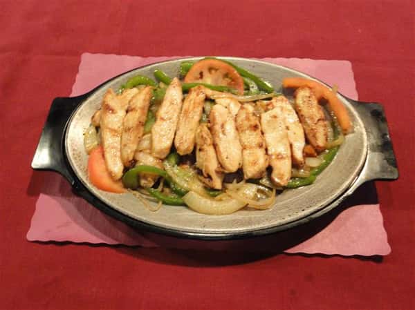 Chicken with tomatoes, peppers, and onion