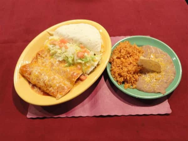 Tacos with a side of rice and beans