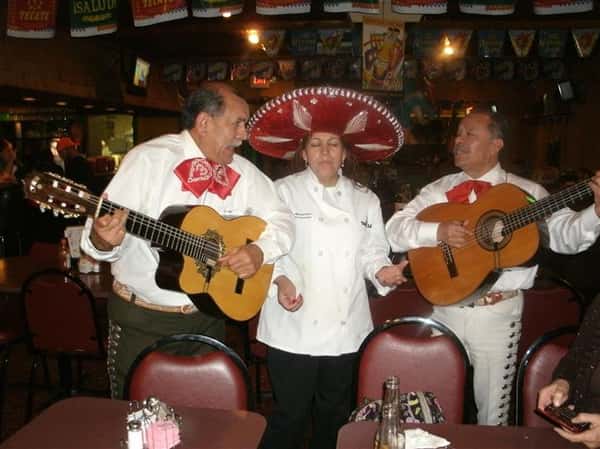 Live Performers singing and playing guitar