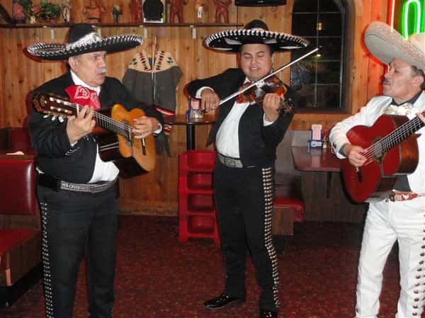 Live performers playing instruments