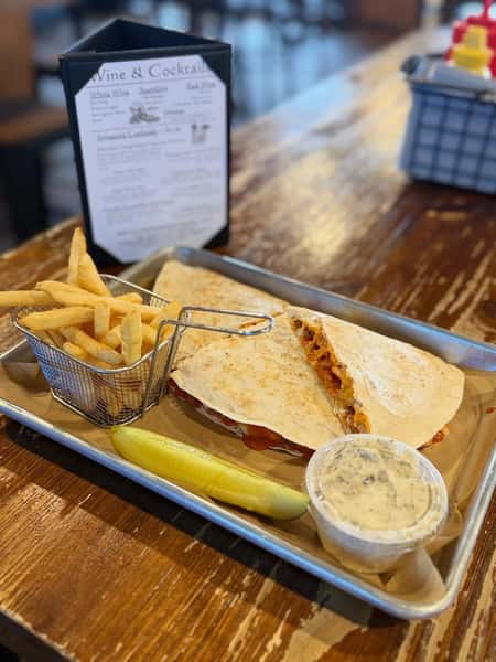 Warning: this week's special may cause extreme cravings! Buffalo chicken quesadilla with a side of fries. DELICIOUS 🤤
