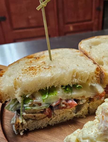 Sandwich with cheese and steak