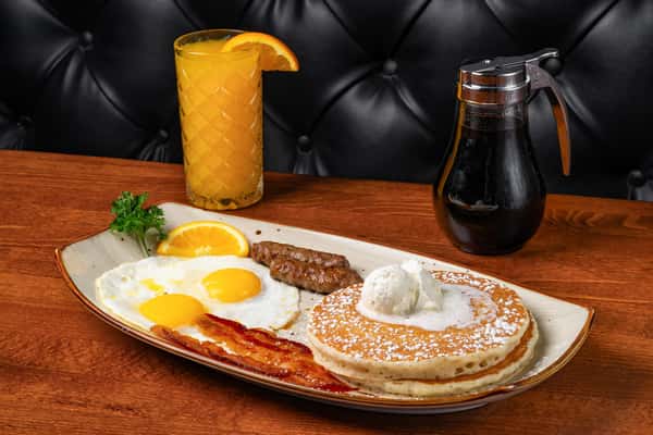 bacon and eggs with sausage and pancakes