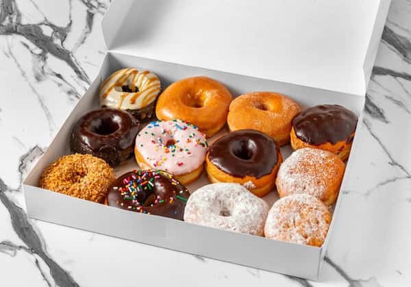 A dozen donuts in a box
