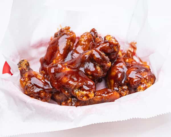 Crispy Jumbo Wings Tossed in Your Choice of Sauce