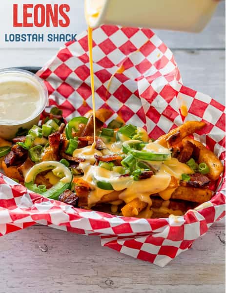 Game day snack, upgraded. 🏈🧀
Loaded fries with cheese, bacon, and jalapeños. All topped with green onions and served with a side of ranch.
Open till 8.