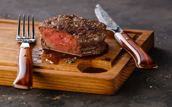 filet mignon on a wood cutting board
