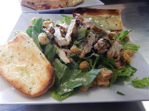 chicken salad with croutons, cheese and garlic bread