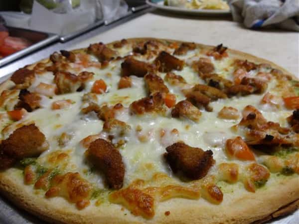 large pizza with extra cheese, chicken and peppers