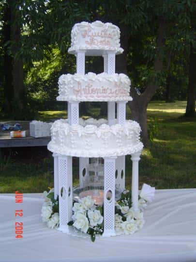 three layer wedding cake outdoors