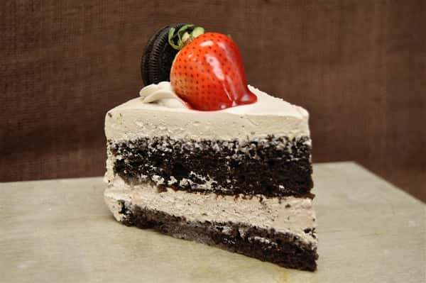 chocolate mousse cake slice with a strawberry on top