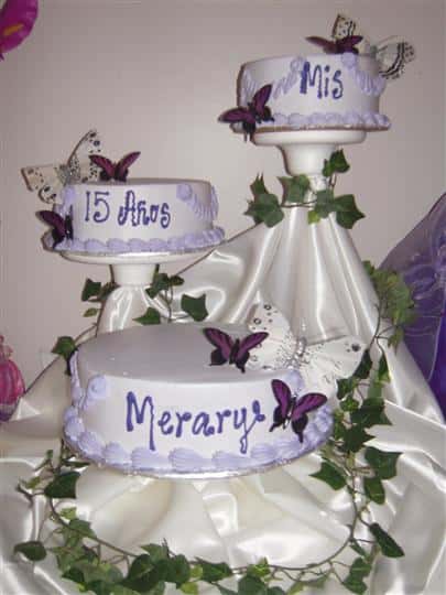 three seperate cakes being displayed