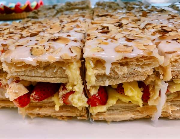napolean cake slice with almonds and strawberries