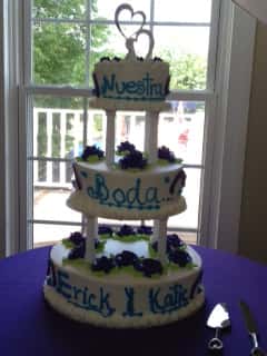 three layer cake with vanilla icing