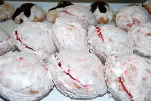 assortment of bakery cookies with powered sugar