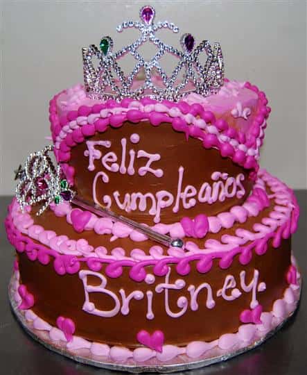 birthday cake being displayed with chocolate ici