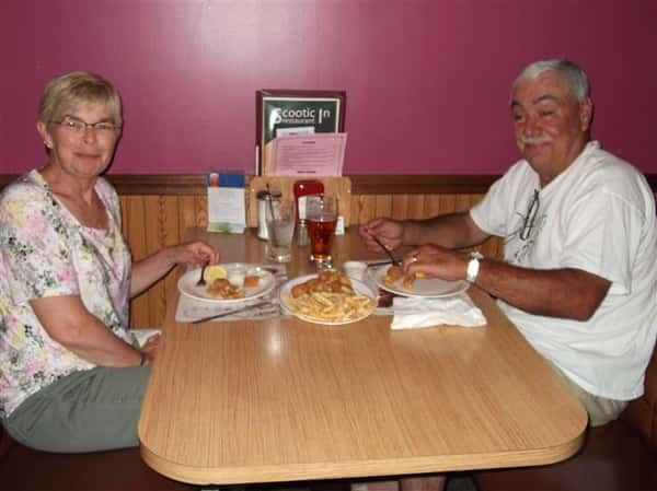 Couple having dinner at the dining booth