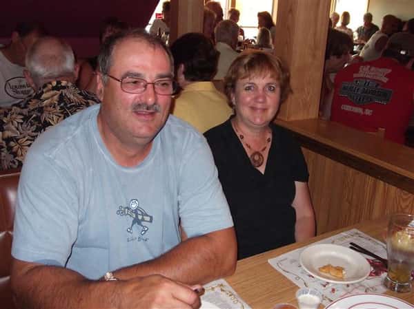 Couple posing for photo at the restaurant