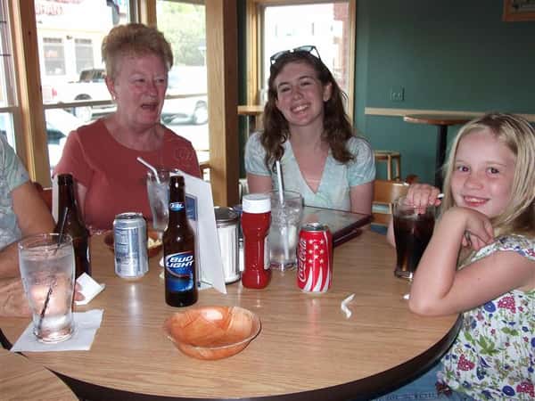 group-students-friends-eat-italian-pizza-hands-take-slices-pizza-restaurant