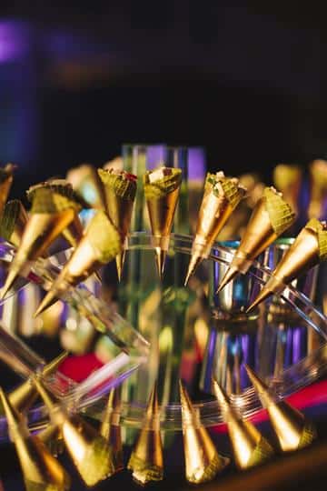 closeup of waffle cones in bronze holders
