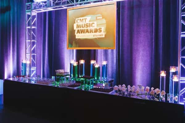 dessert table with "CMT Music Awards" sign above
