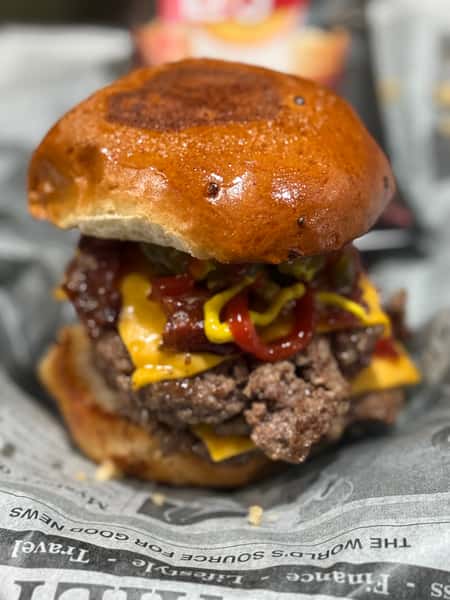 Meat burger with glazed buns and sauces