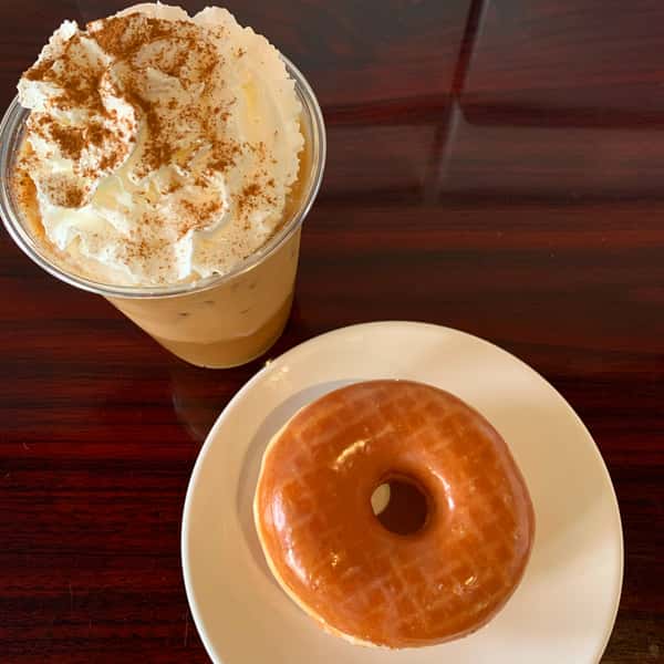 iced latte pairs well with a fresh glazed doughnut