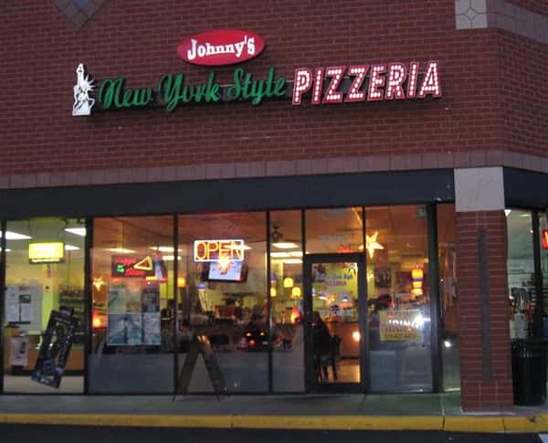 exterior brick building to johnny's new york style pizzeria & restaurant