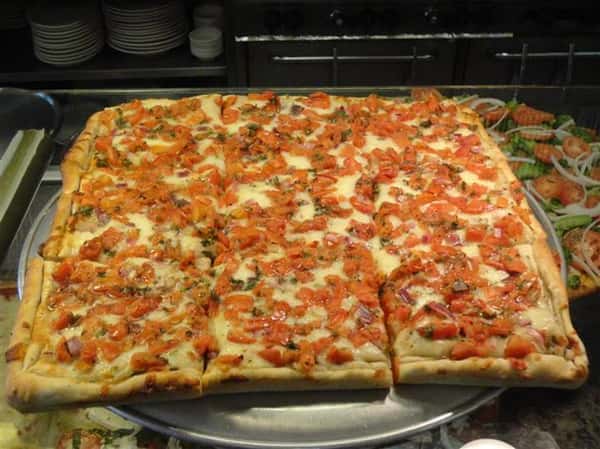 large Sicilian Pizza with tomatoes and cheese