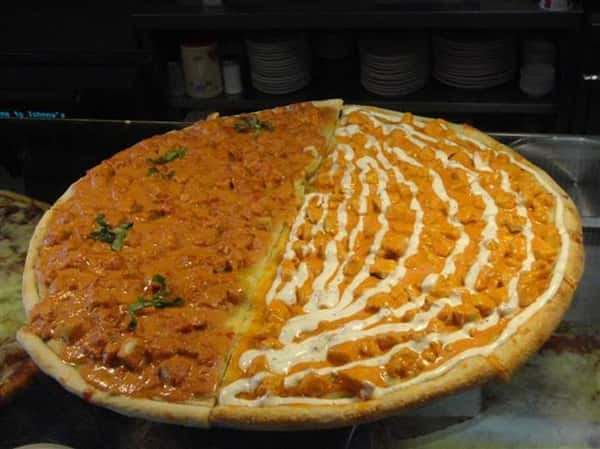 large split pizza with buffalo chicken and chicken alla vodka