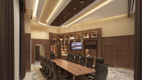 Private dining and executive meeting room with elegant wood finishes, built-in displays, and upscale seating for business gatherings.