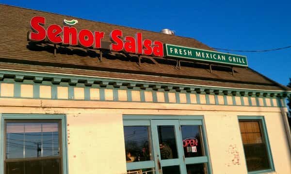 Exterior shot of restaurant sign on the main entrance