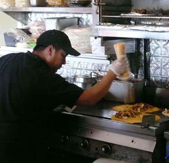 Kitchen staff preparing food