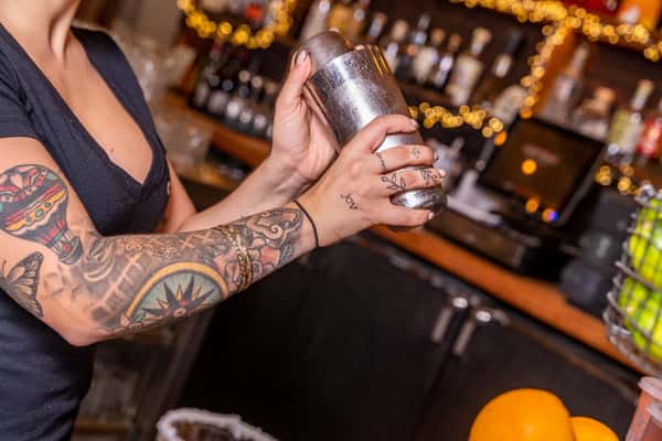 bartender mixing drink in shaker